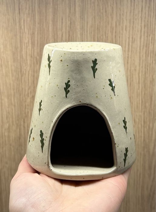 Ceramiczny kominek roslinne przestrzenie