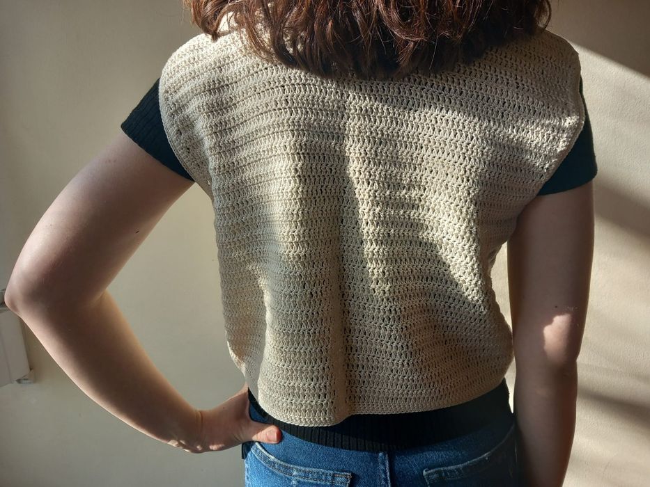 Colete de malha em algodão.