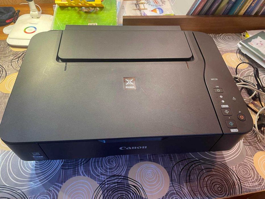 Canon PIXMA MP230 робить, друкує