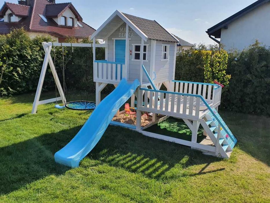 Domek ogrodowy plac zabaw huśtawka