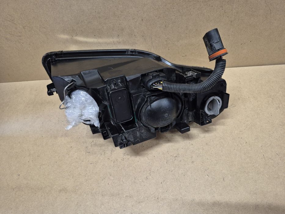 Lampa reflektor audi A4 b7 lewy europa cala