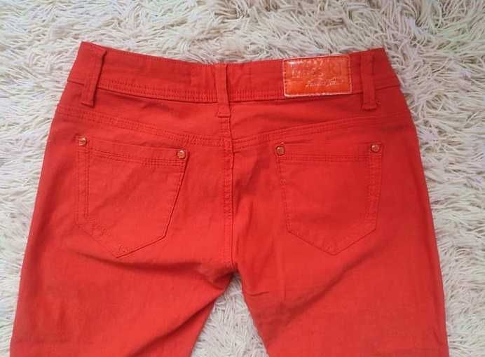 Czerwone spodnie jeansy rozm. L