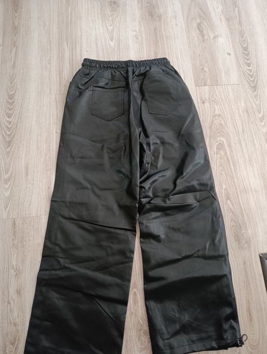 Продам шкіряні штани 48 р