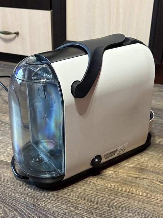 Капсульна кавомашина Tchibo Cafissomo