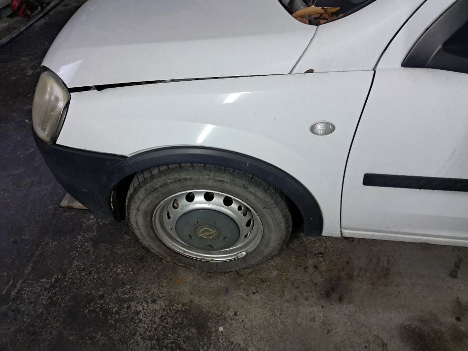 Błotnik Opel combo prawy  lewy 474