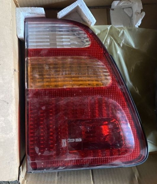 Фонари задні оригінал Toyota Land Cruiser 100 1998-2005
