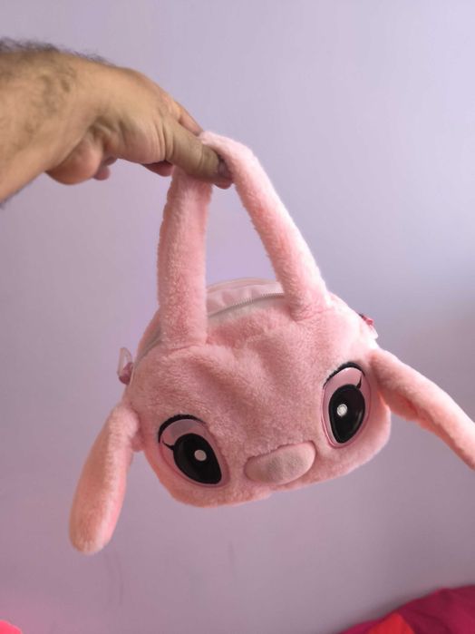 Peluche Angel Gigante com oferta de bolsa Angel, como novo.