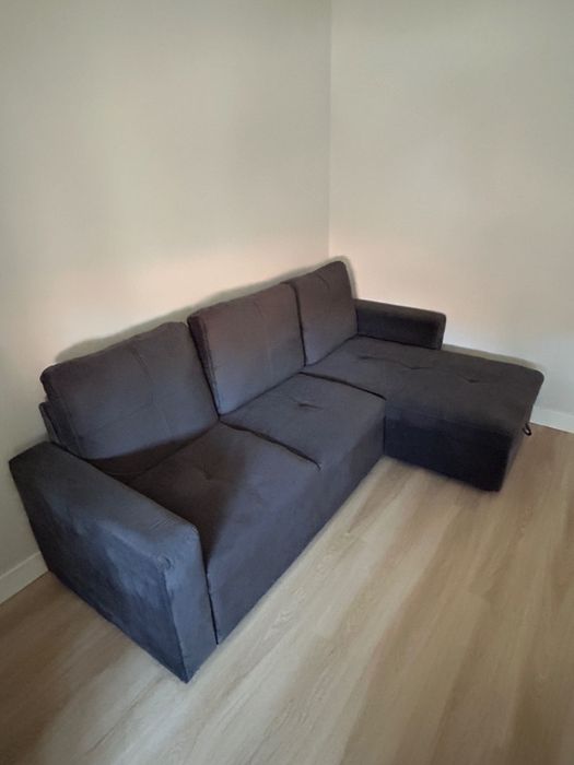 Sofá cama com chaise longue e arrumação – Cinzento escuro | Conforama