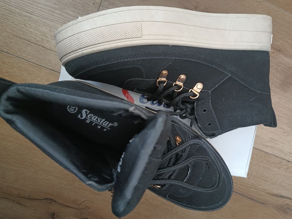 Buty na wyższej podeszwie seastar