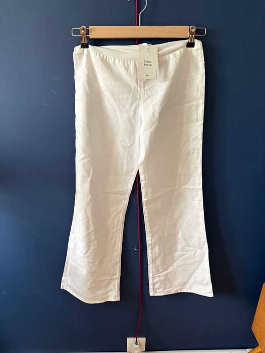 Białe spodnie lniane z lnem H&M