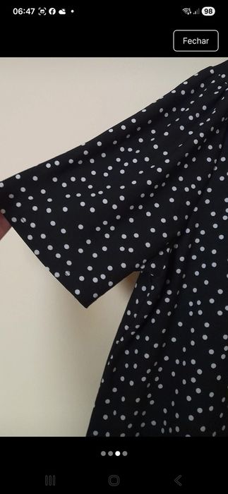 Vestido preto com bolinhas brancas