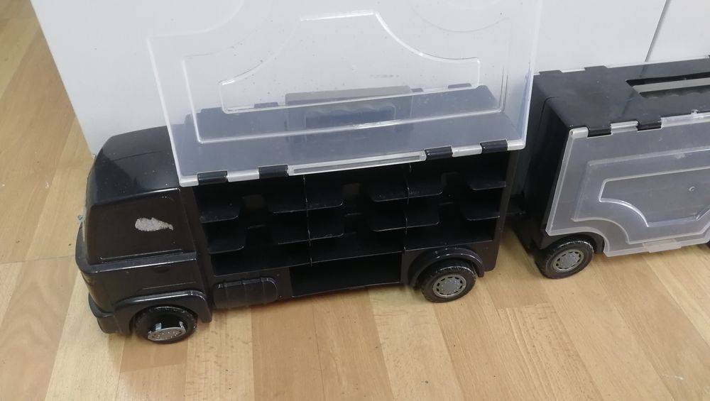 Porta carrinhos em bom estado (brinquedo)