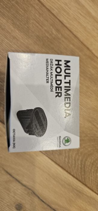 Oryginalny uchwyt na smartfona w cupholder Skoda Octavia IV