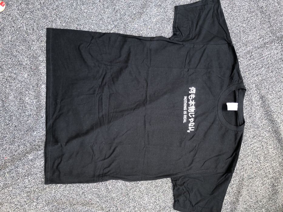 T -shirt oversize czarny z napisem nowy  Bawełna 100% Wymiary  Dł 73 c
