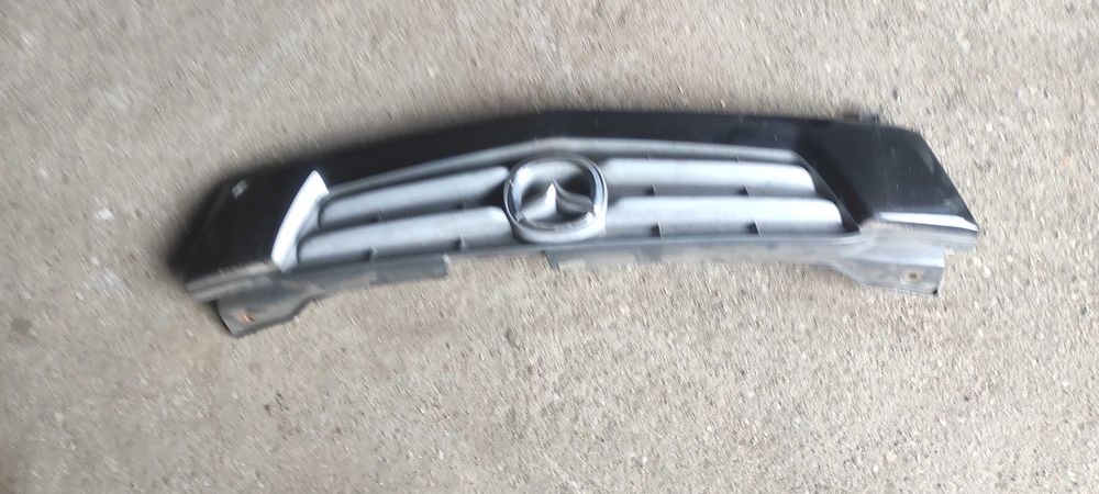 mazda demio 2003 grill