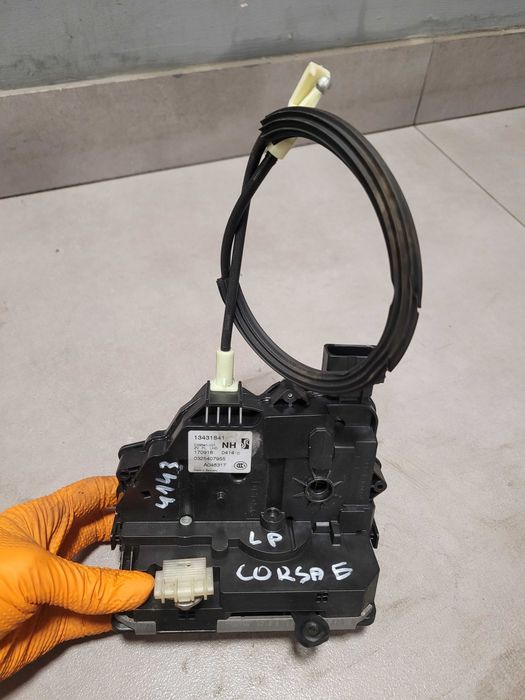Zamek drzwi lewy przód lewy przedni Opel Corsa E 134.318.41 6-PIN