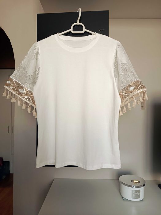 Nowa Śmietankowa bluzka na krótki rękaw boho frędzle