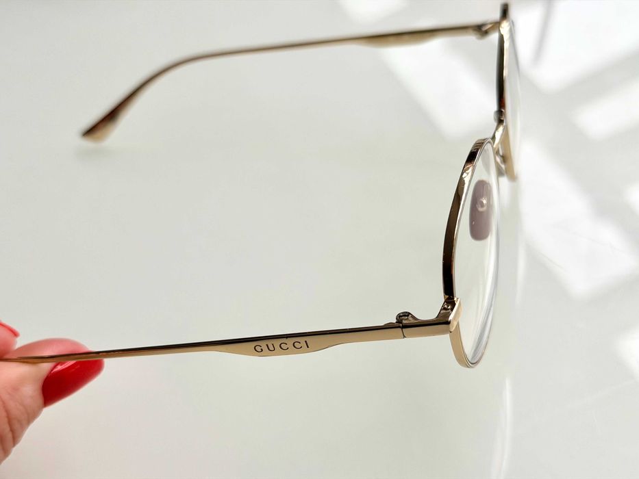 Óculos Gucci armação dourada