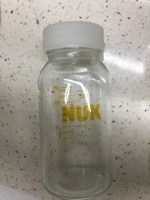 Скляна пляшка для годування 125 ml nuk, б/в