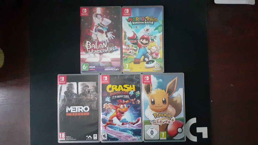 Nintendo Switch Lite + 5 ігор на картриджах