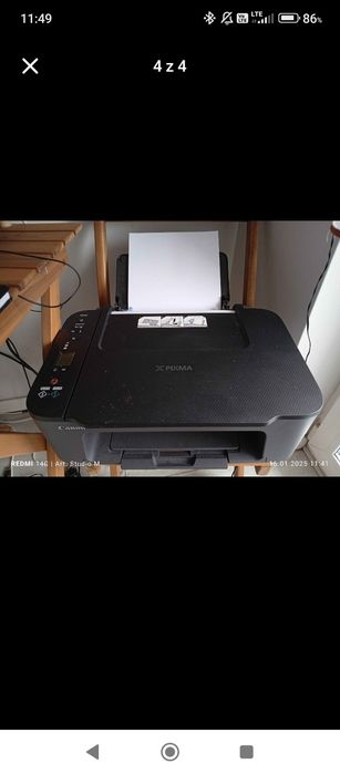 Terminal HP z monitorem i drukarką canon