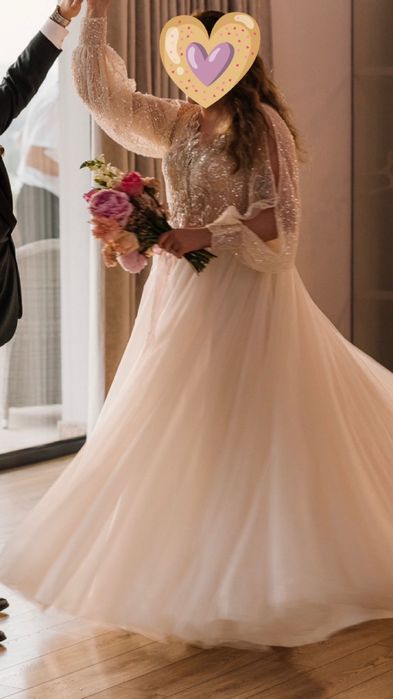 Suknia ślubna z długim rękawem