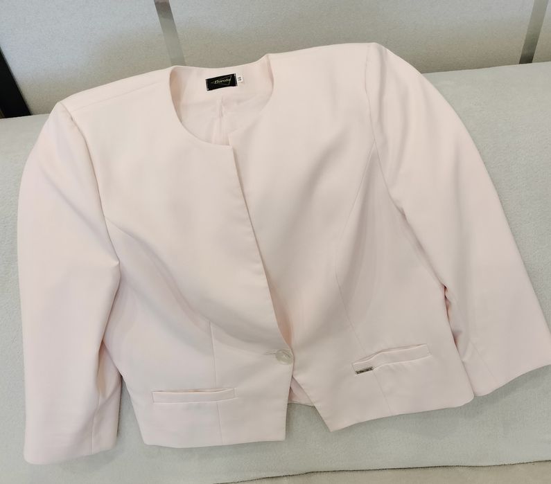 Używana elegancka marynarka w kolorze jasnego różu
