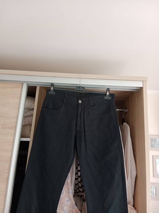 Eleganckie czarne spodnie męskie garniturowe Janimen M