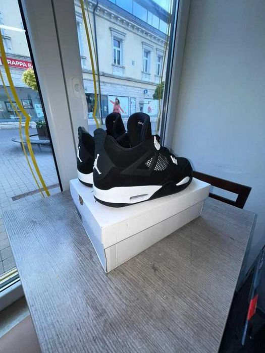 Jordan 4 Retro White Thunder R.39