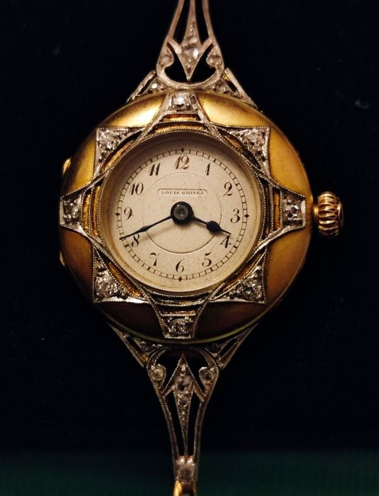 Золотые часы женские