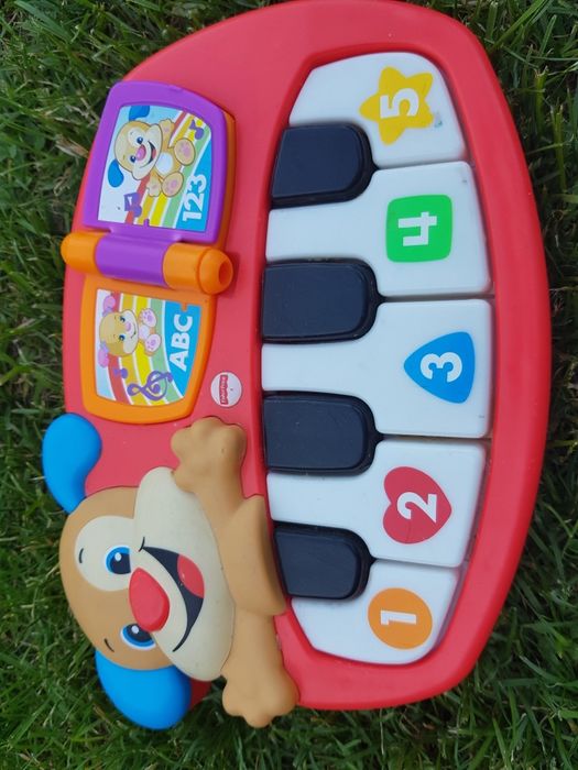 Zabawka pianinko szczeniaczka Fischer price