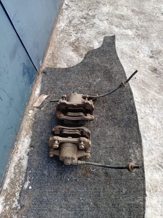 Передние суппорта Fiat Doblo 2008