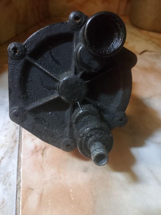 Вакумний насос Форд Конект