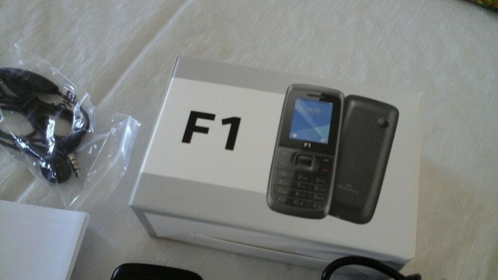 Telemóveis Siemens e Nokia e F1 e suporte magnético telemóvel