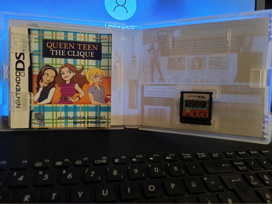 Nintendo DS Pink na caixa e 4 jogos