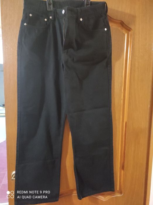 Нові чорні широкі джинси на хлопця р. 164