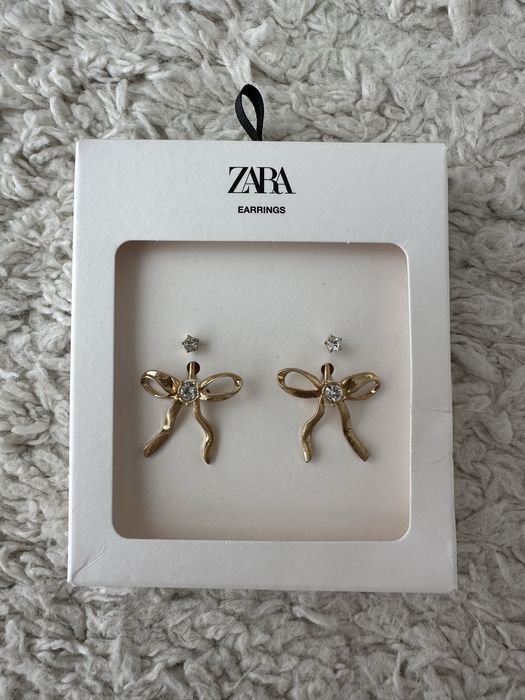 Brincos dourados em forma de laço ZARA