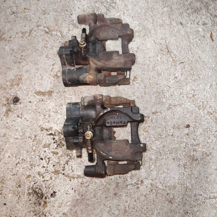 Zacisk hamulcowy elektryczny prawy, lewy tył Ford Mondeo MK5, Kuga