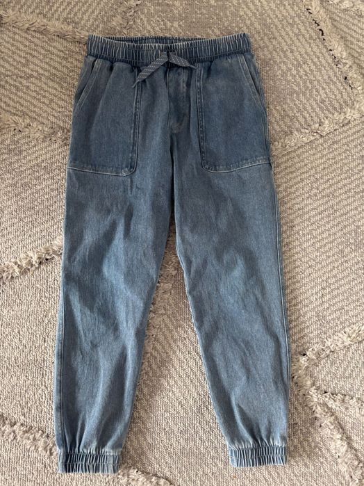 Joggersy H&M dla chłopca niebieski dżins 140 cm