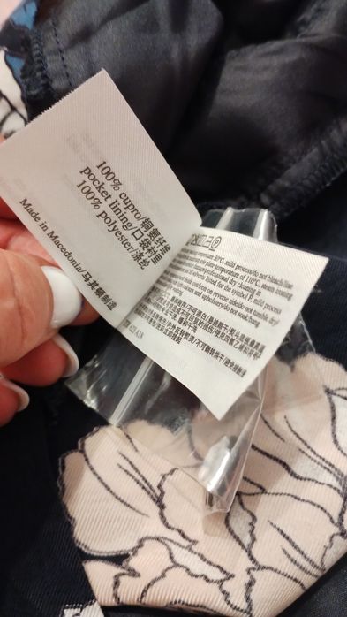 Spodnie typu palazzo z cupro marki Laura Ashley.