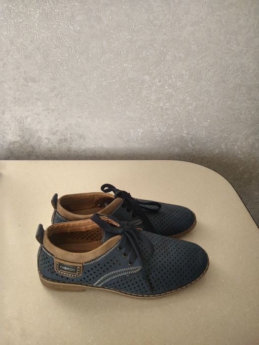 Туфлі з перфорацією