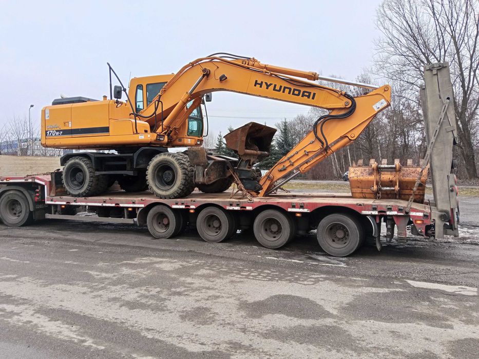 Usługi | Roboty ziemne | Koparka kołowa | Wywrotki 4-osiowe |