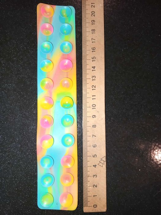 Сквидопоп (Squidopop) (21 см.) антистресс игрушка липка на присосках.