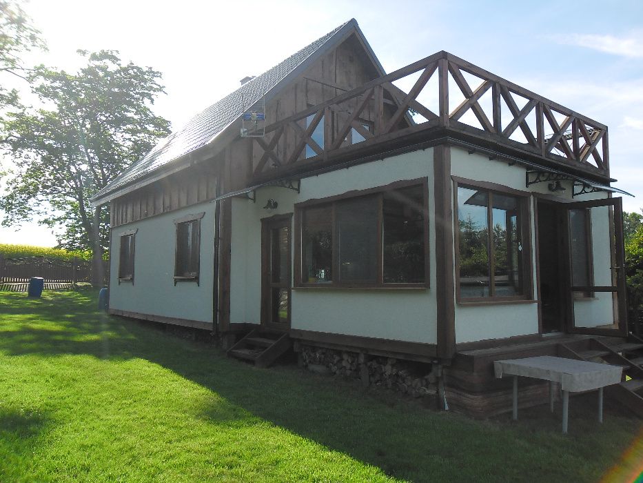 Dom nad jeziorem z linią brzegową-10 osób. Z prywatną plażą i pomostem