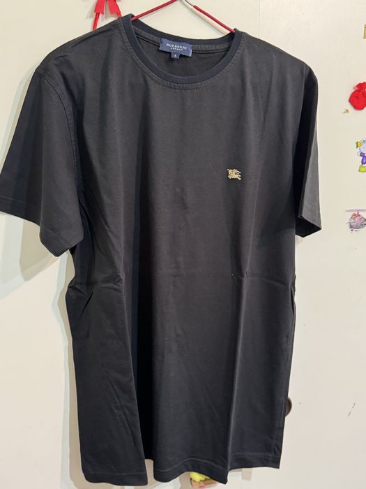Tshirts Versage e Burberry