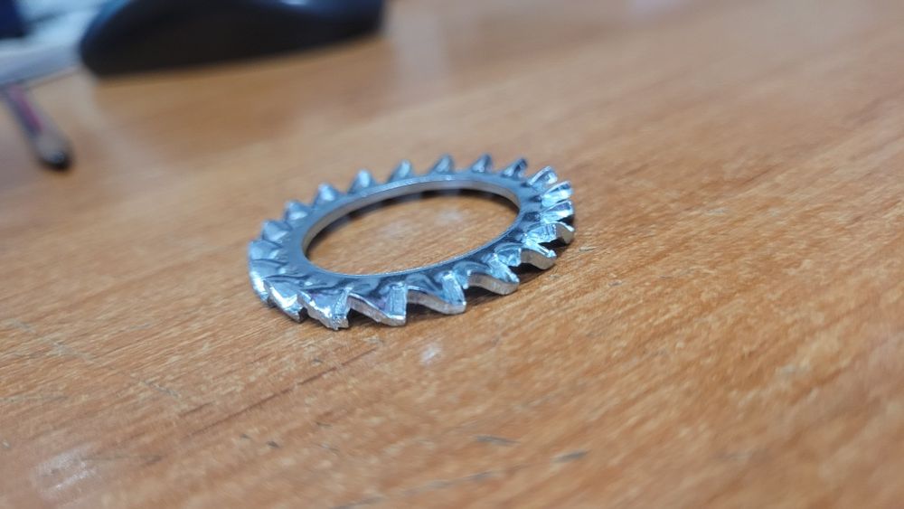 Podkładka koronkowa fi24 (25) DIN 6798A