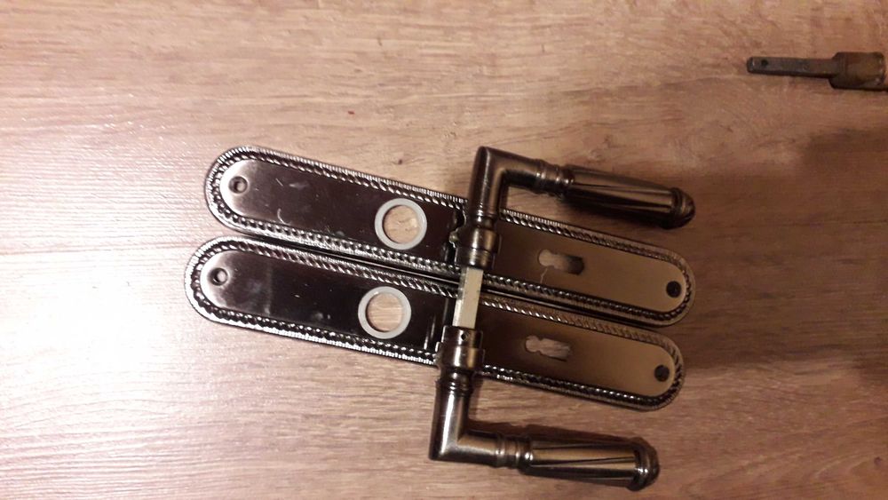 klamka z szyldem srebrna