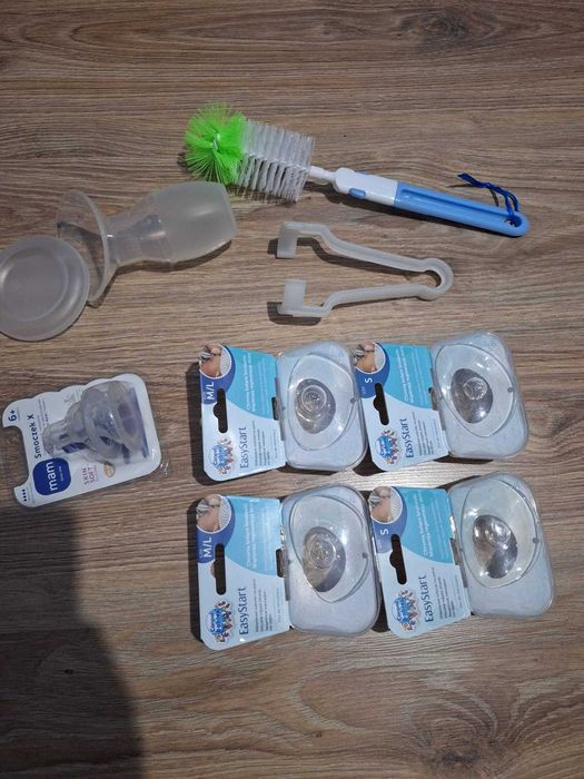 Nakładki na brodawki, magiczna butelka, smoczek do kaszki