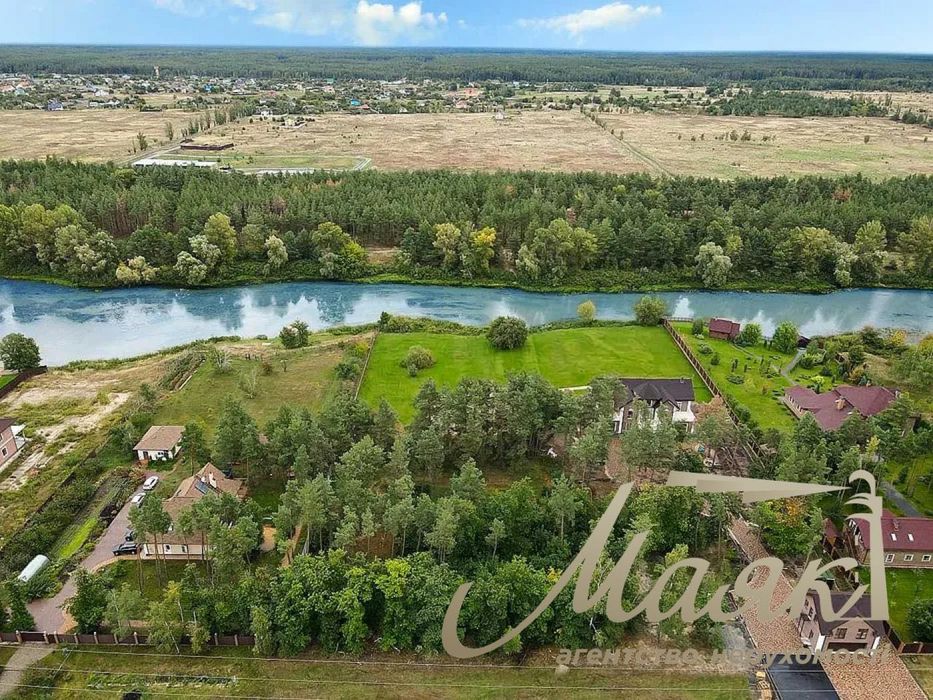 Продаж будинку площею 418,6 м² з виходом до води на ділянці 50 соток у КМ Dream Village, с. Лебедівка
