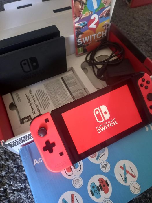 Nintendo Switch V1 completo na caixa com jogo e acessórios